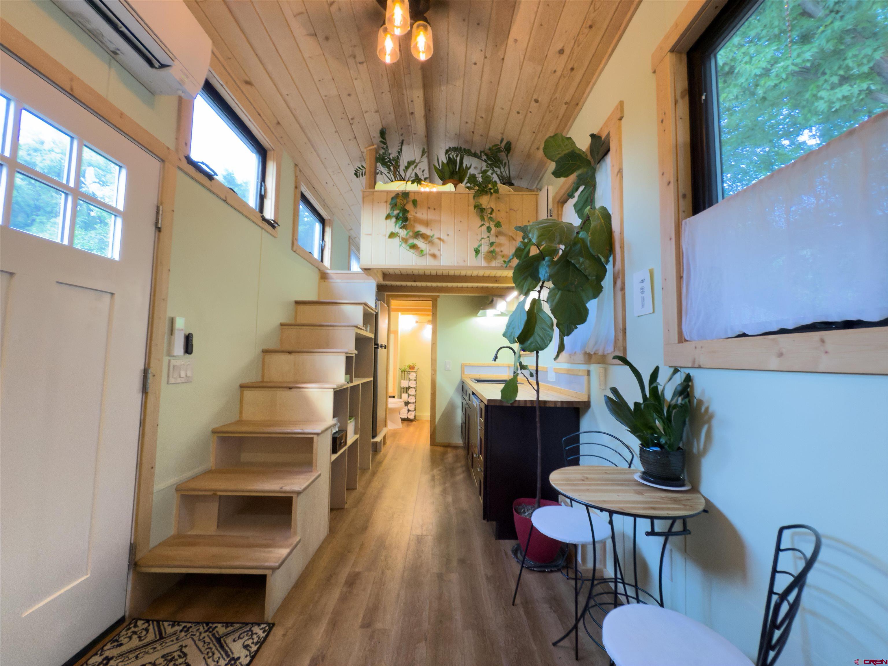 485 Florida Road, Unit C5 Durango, CO 81301 - Photo 21 of 40 a view of entryway and hall with wooden floor