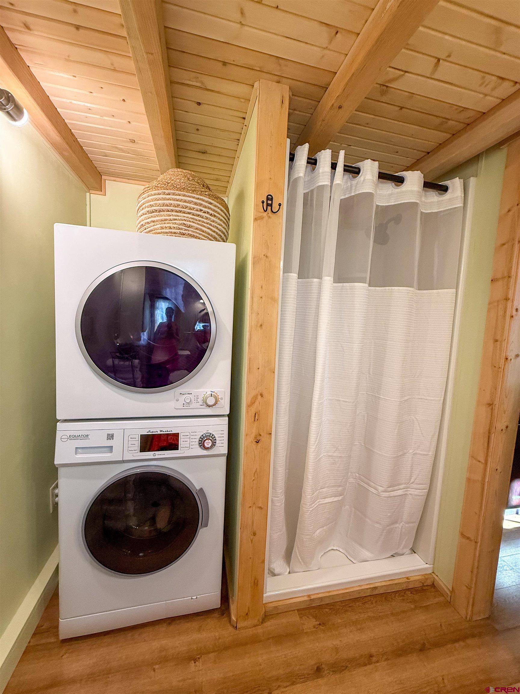 485 Florida Road, Unit C5 Durango, CO 81301 - Photo 22 of 40 a view of a hallway with washer and dryer