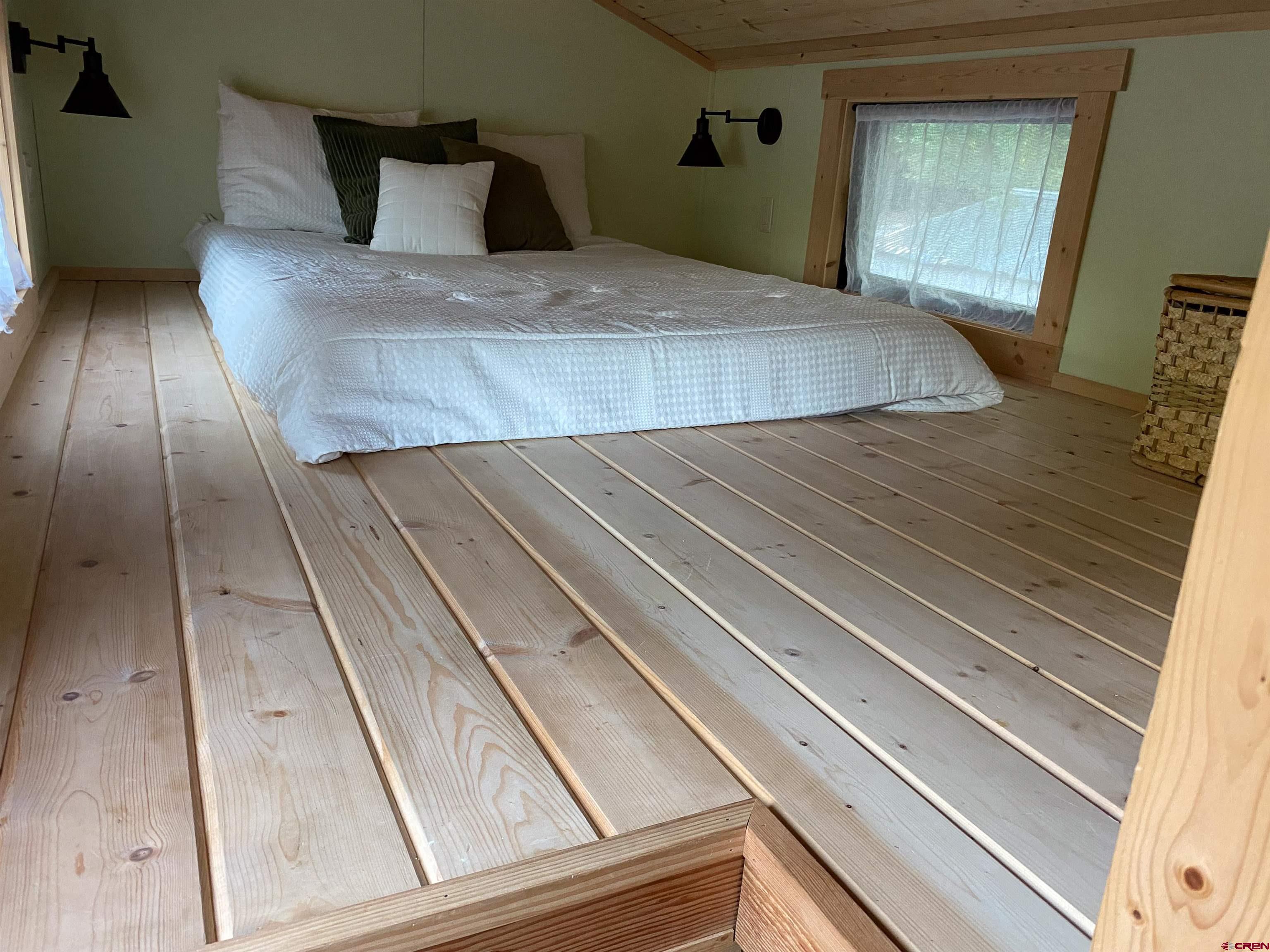 485 Florida Road, Unit C5 Durango, CO 81301 - Photo 29 of 40 a bedroom with a bed and window