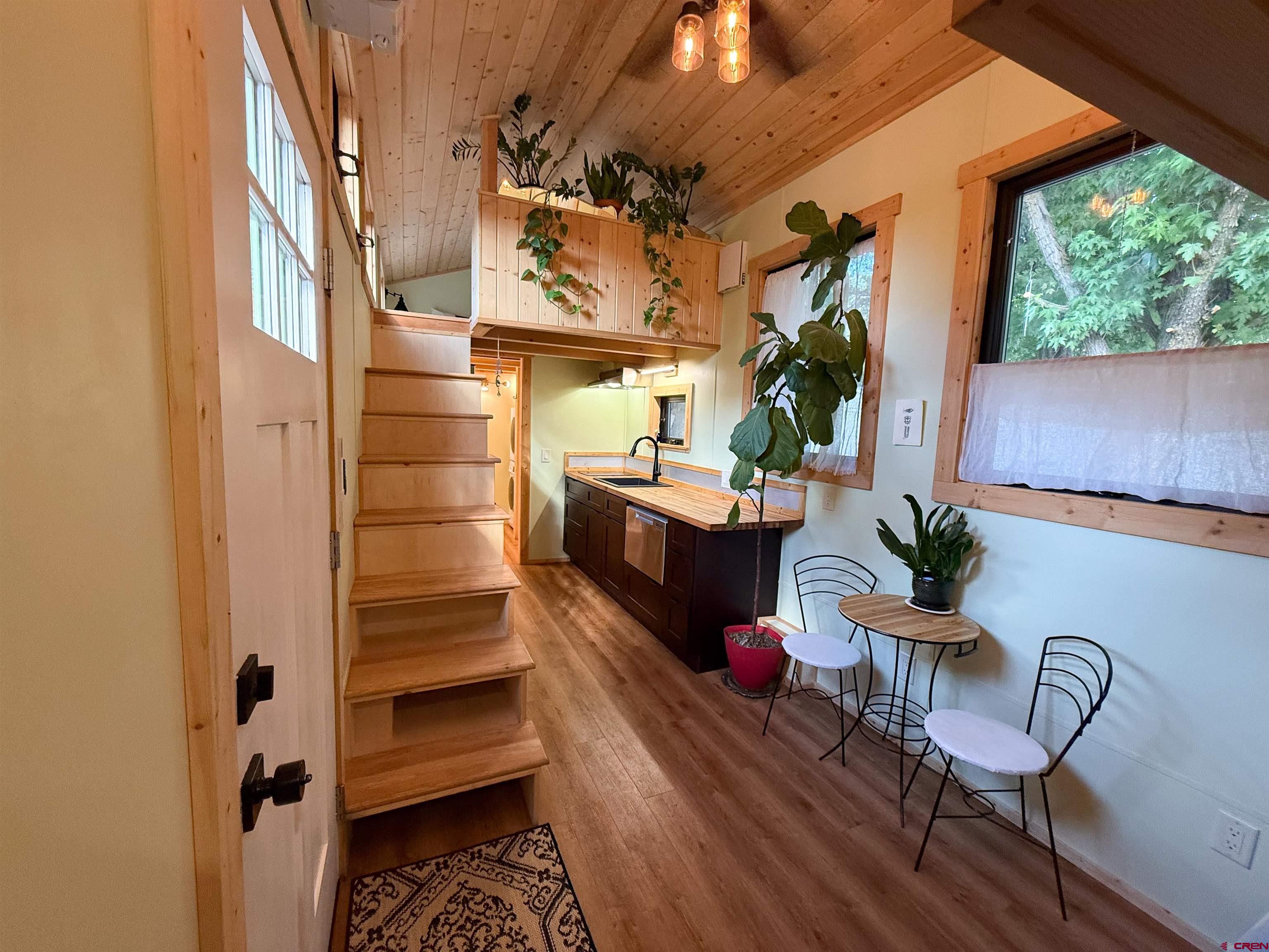 485 Florida Road, Unit C5 Durango, CO 81301 - Photo 3 of 40 a balcony with furniture and a potted plant