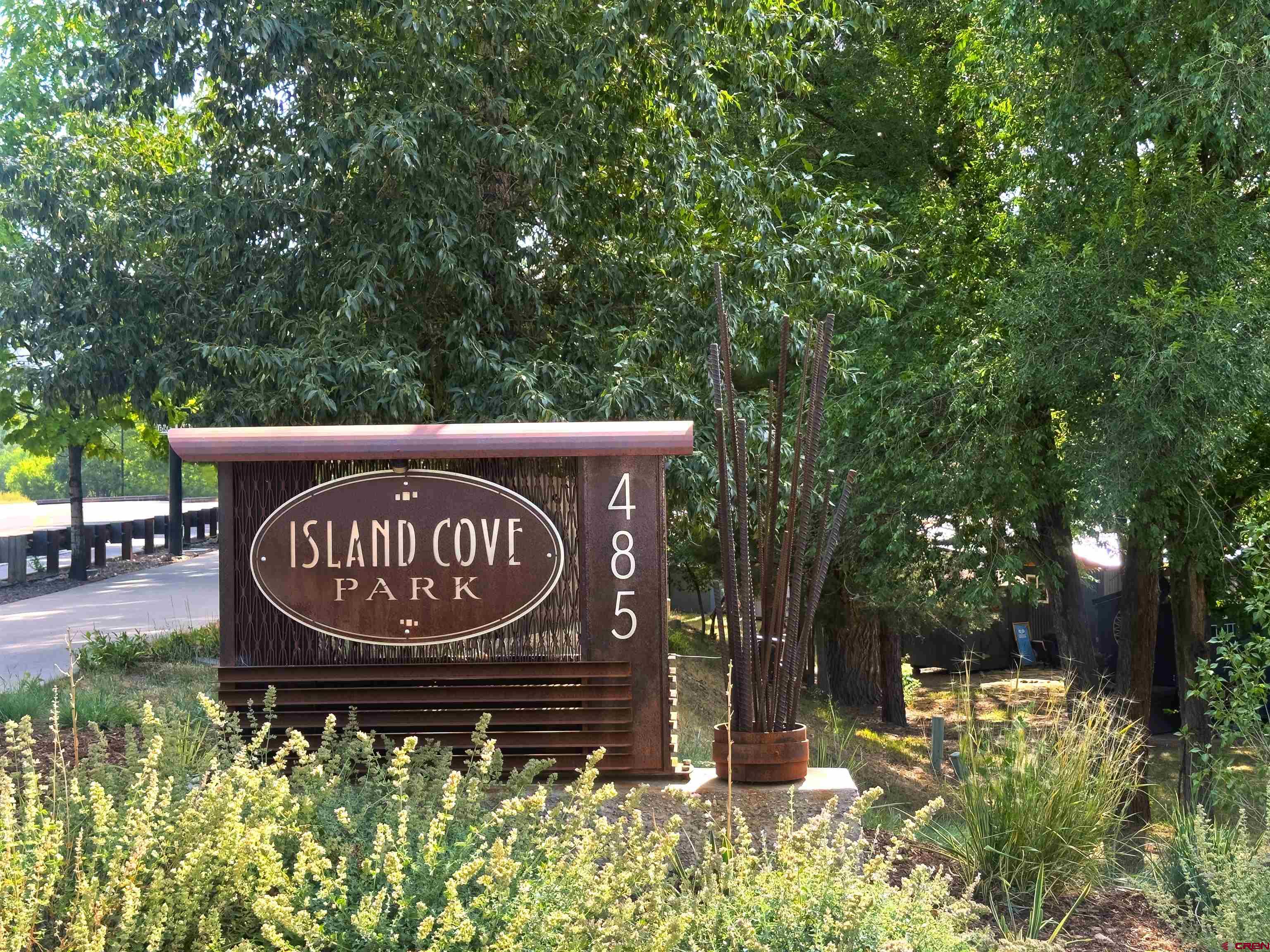 485 Florida Road, Unit C5 Durango, CO 81301 - Photo 37 of 40 a sign that is sitting on a brick wall