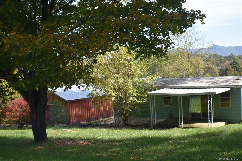 49 Trantham Road Canton, NC 28716 - Photo 3 of 10 a view of house with a yard