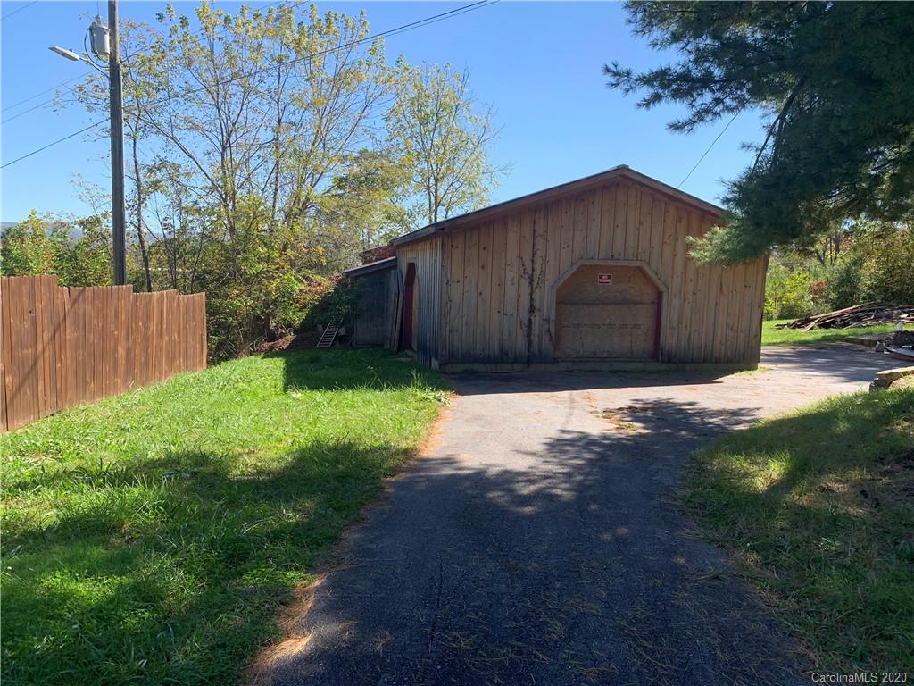 49 Trantham Road Canton, NC 28716 - Photo 4 of 10 a house with a yard