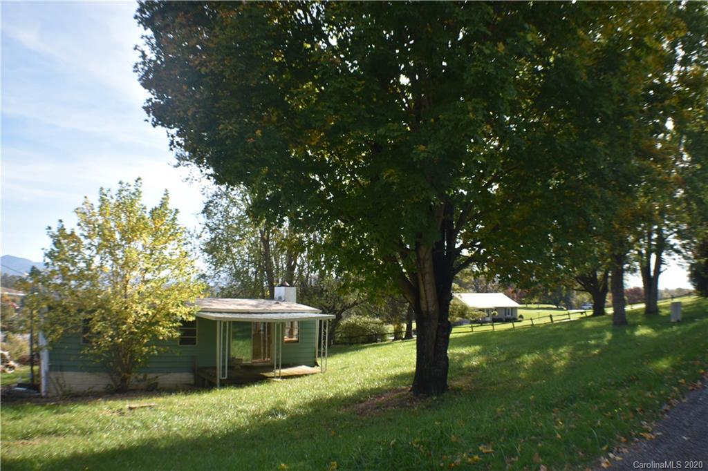 49 Trantham Road Canton, NC 28716 - Photo 7 of 10 a view of an house with backyard space and balcony