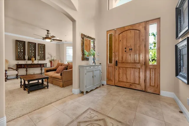 a view of a livingroom with furniture and windows