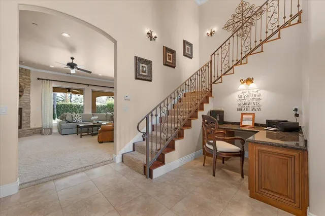 a view of entryway and hall with dining room