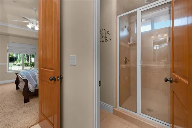a view of a hallway with wooden shelves