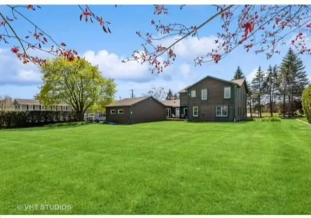 a view of a house with a garden
