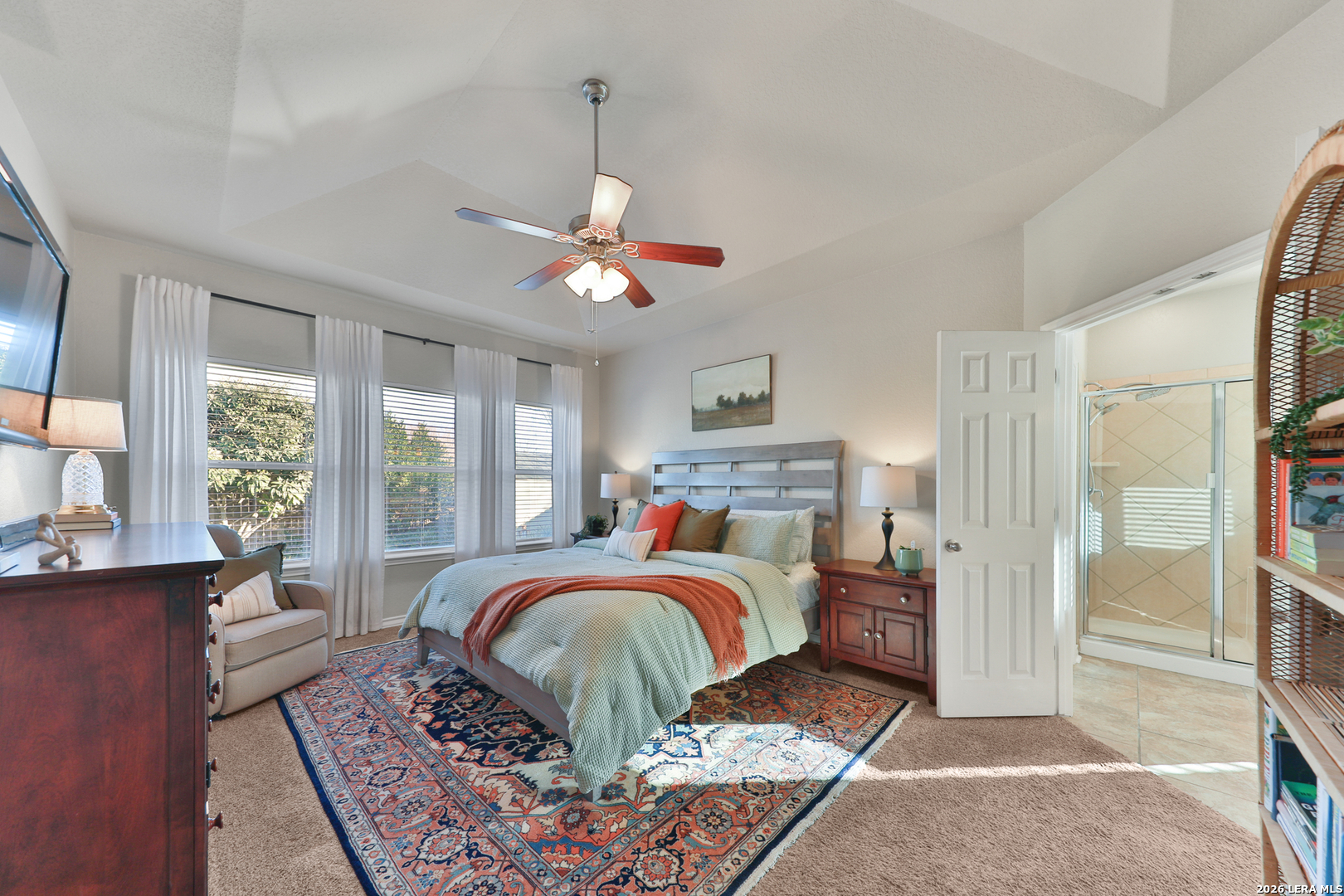 10414 Pecne Path Helotes, TX 78023 - Photo 25 of 42 a bed room with a bed and a window