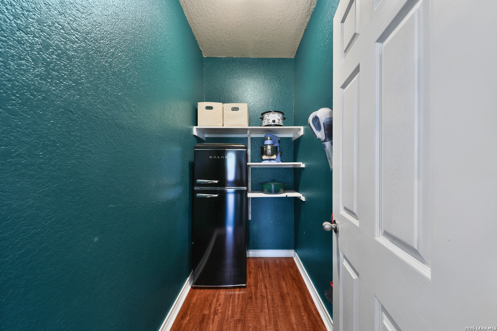 10414 Pecne Path Helotes, TX 78023 - Photo 30 of 42 a view of a room with storage