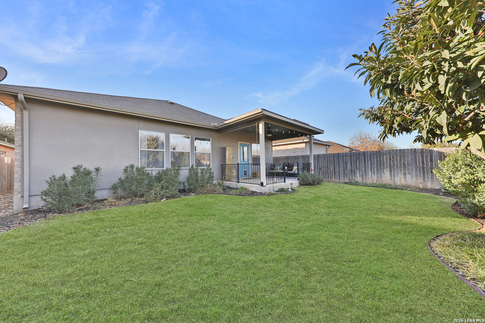 10414 Pecne Path Helotes, TX 78023 - Photo 37 of 42 a front view of a house with garden