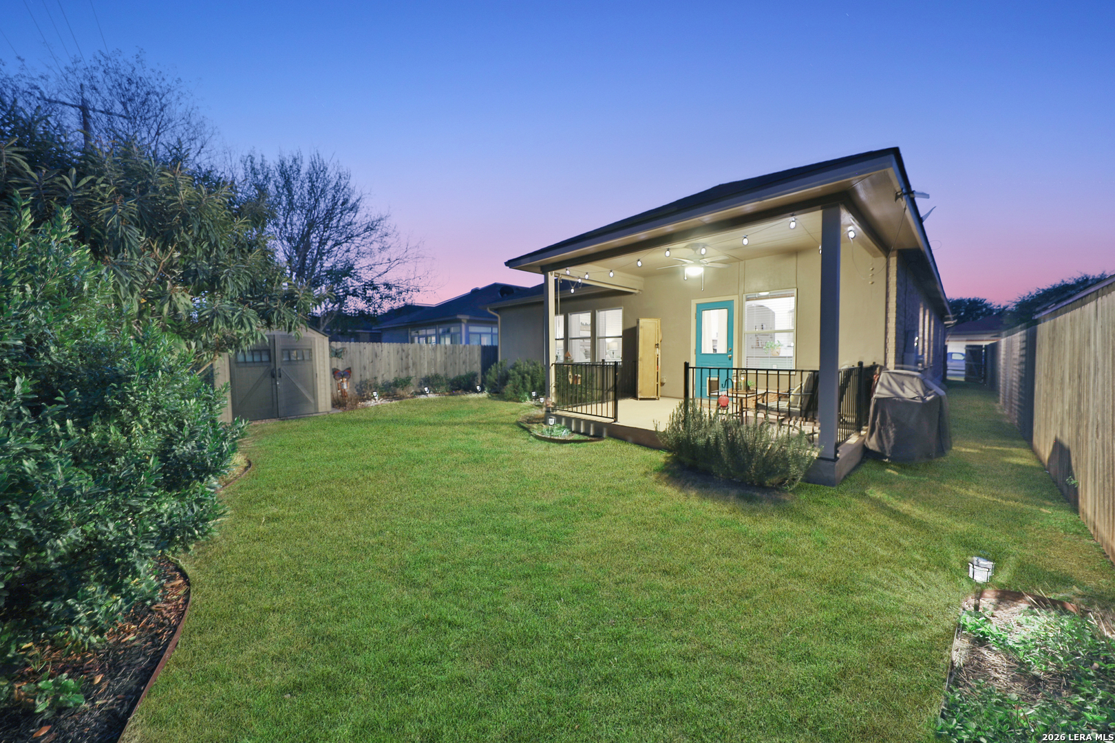 10414 Pecne Path Helotes, TX 78023 - Photo 41 of 42 a view of a house with backyard and porch