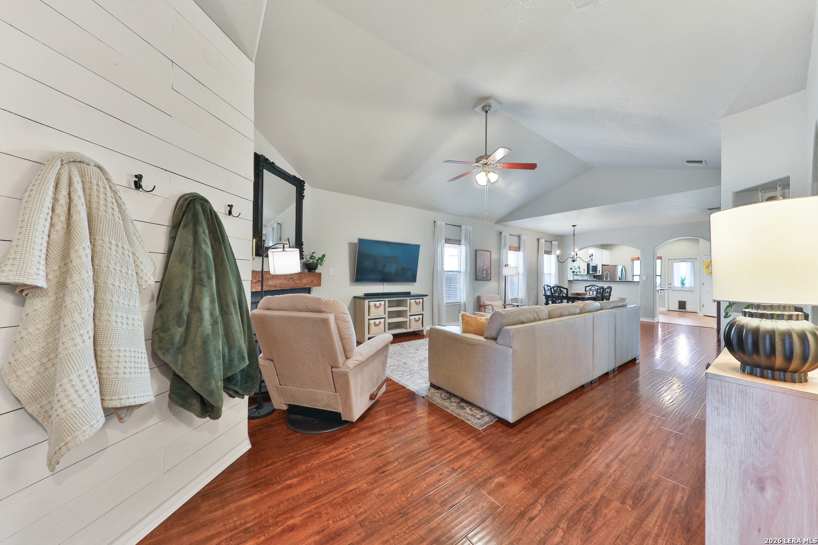 10414 Pecne Path Helotes, TX 78023 - Photo 5 of 42 a living room with furniture and a flat screen tv