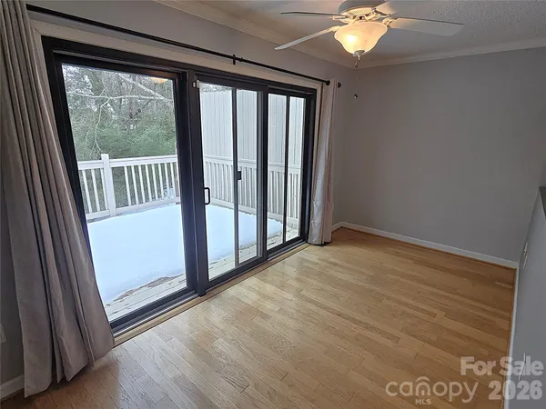 wooden floor and window in an empty room