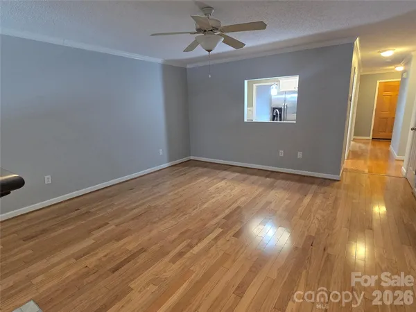 a balcony with wooden floor