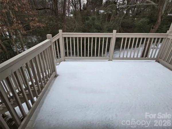 a view of a house with a yard and plants