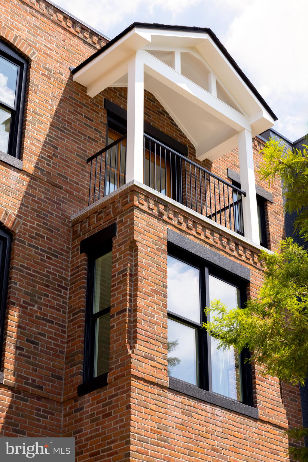 1241 4th Street Northwest Washington, DC 20001 - Photo 4 of 50 Pale brick exterior with dark trim