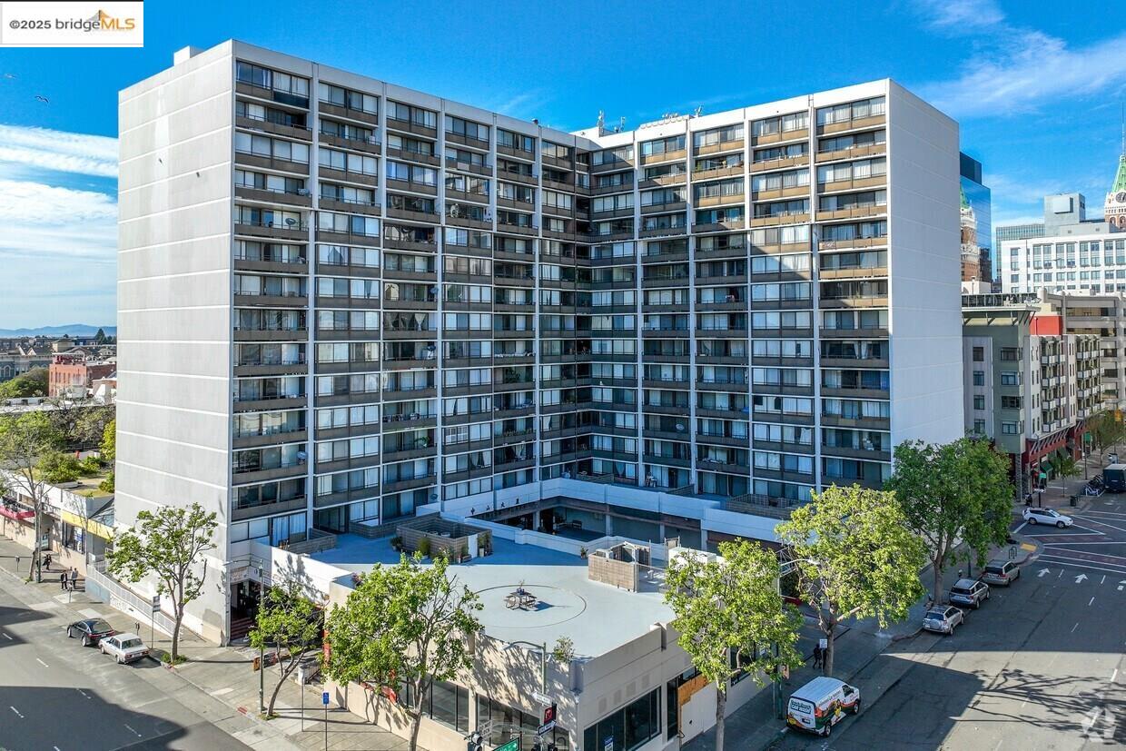 801 Franklin Street, Unit 902 Oakland, CA 94607 - Photo 1 of 1 View of apartment building / complex featuring a view of city