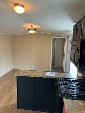 557 Southwest Cutoff, Unit 100 Worcester, MA 01607 - Photo 15 of 31 a view of a kitchen with granite countertop