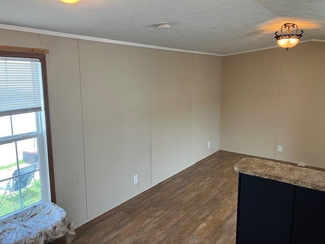 557 Southwest Cutoff, Unit 100 Worcester, MA 01607 - Photo 16 of 31 wooden floor in an empty room with a window