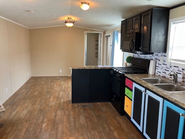 557 Southwest Cutoff, Unit 100 Worcester, MA 01607 - Photo 5 of 31 a kitchen with sink and cabinets