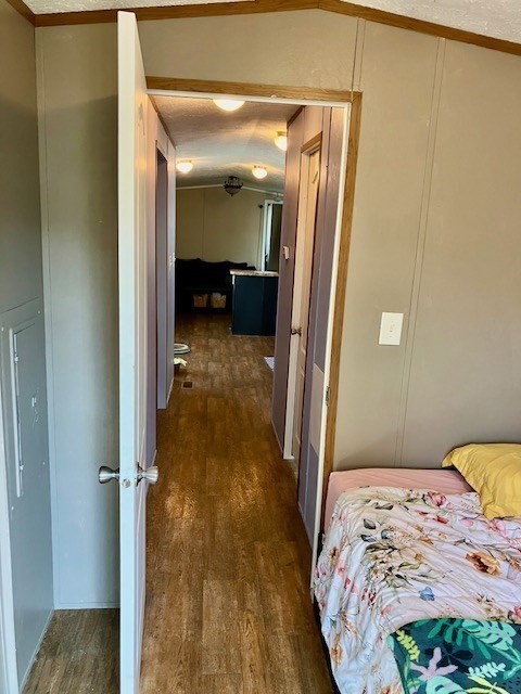 557 Southwest Cutoff, Unit 100 Worcester, MA 01607 - Photo 9 of 31 a bedroom with a bed and a mirror