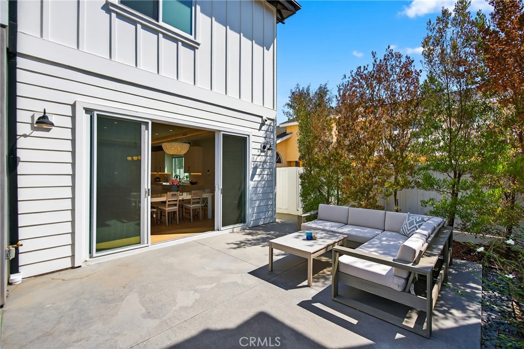 2216 Bataan Road, Unit A Redondo Beach, CA 90278 - Photo 21 of 60 a view of a patio with couches table and chairs and potted plants