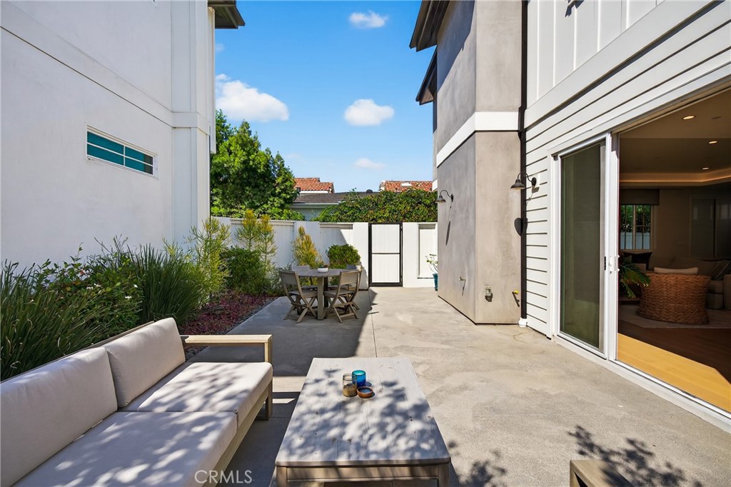 2216 Bataan Road, Unit A Redondo Beach, CA 90278 - Photo 22 of 60 a view of a patio with couches and potted plants
