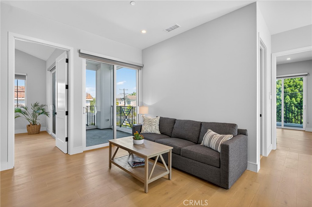 2216 Bataan Road, Unit A Redondo Beach, CA 90278 - Photo 27 of 60 a living room with furniture and a gate