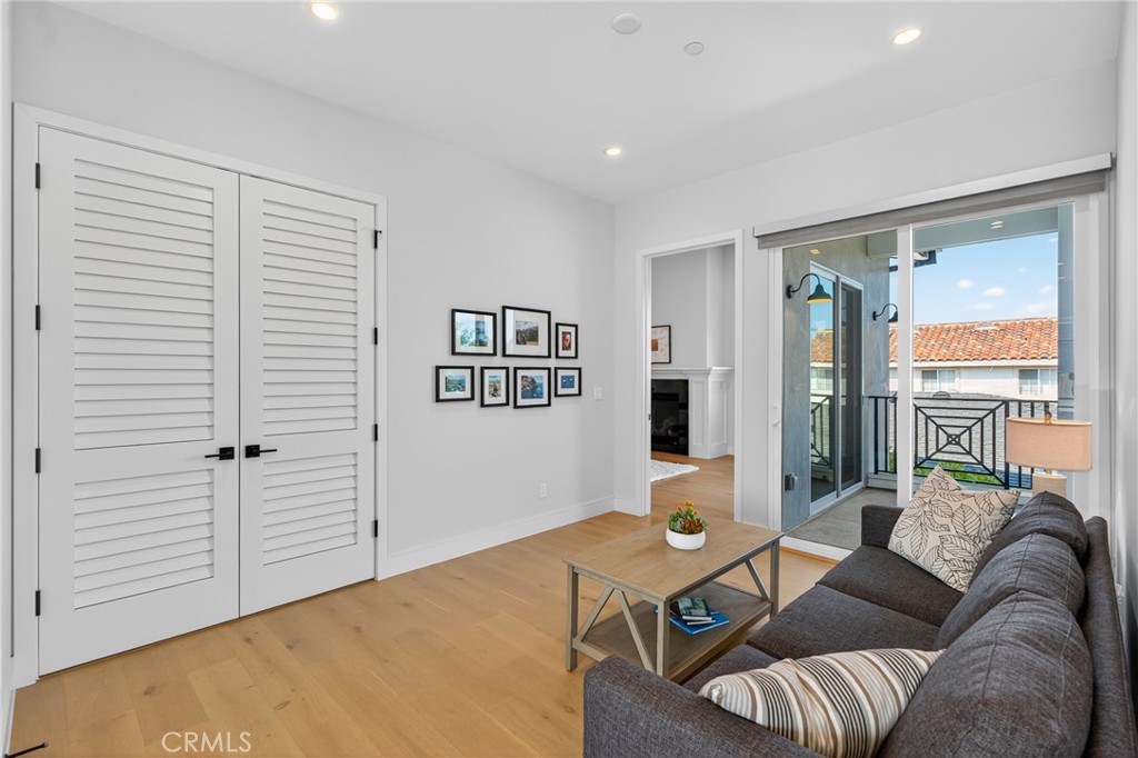 2216 Bataan Road, Unit A Redondo Beach, CA 90278 - Photo 28 of 60 a living room with furniture and a large window
