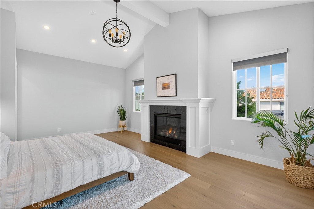 2216 Bataan Road, Unit A Redondo Beach, CA 90278 - Photo 32 of 60 a spacious bedroom with a bed and a potted plant