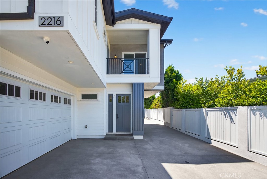 2216 Bataan Road, Unit A Redondo Beach, CA 90278 - Photo 4 of 60 a front view of a house with a garage