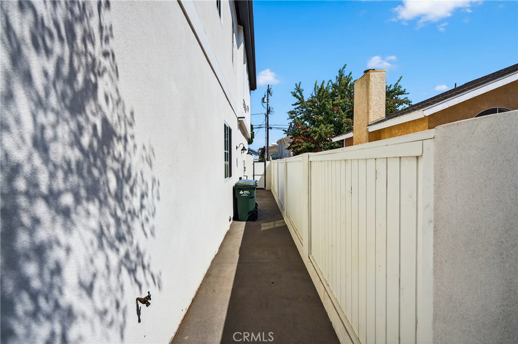 2216 Bataan Road, Unit A Redondo Beach, CA 90278 - Photo 53 of 60 a view of a balcony with wooden floor and stairs