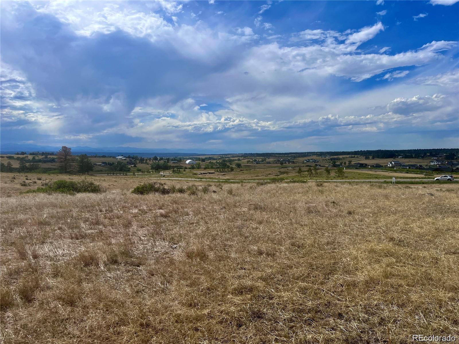 75 Evening Hunt Road Franktown, CO 80116 - Photo 2 of 7 a view of an outdoor space and yard