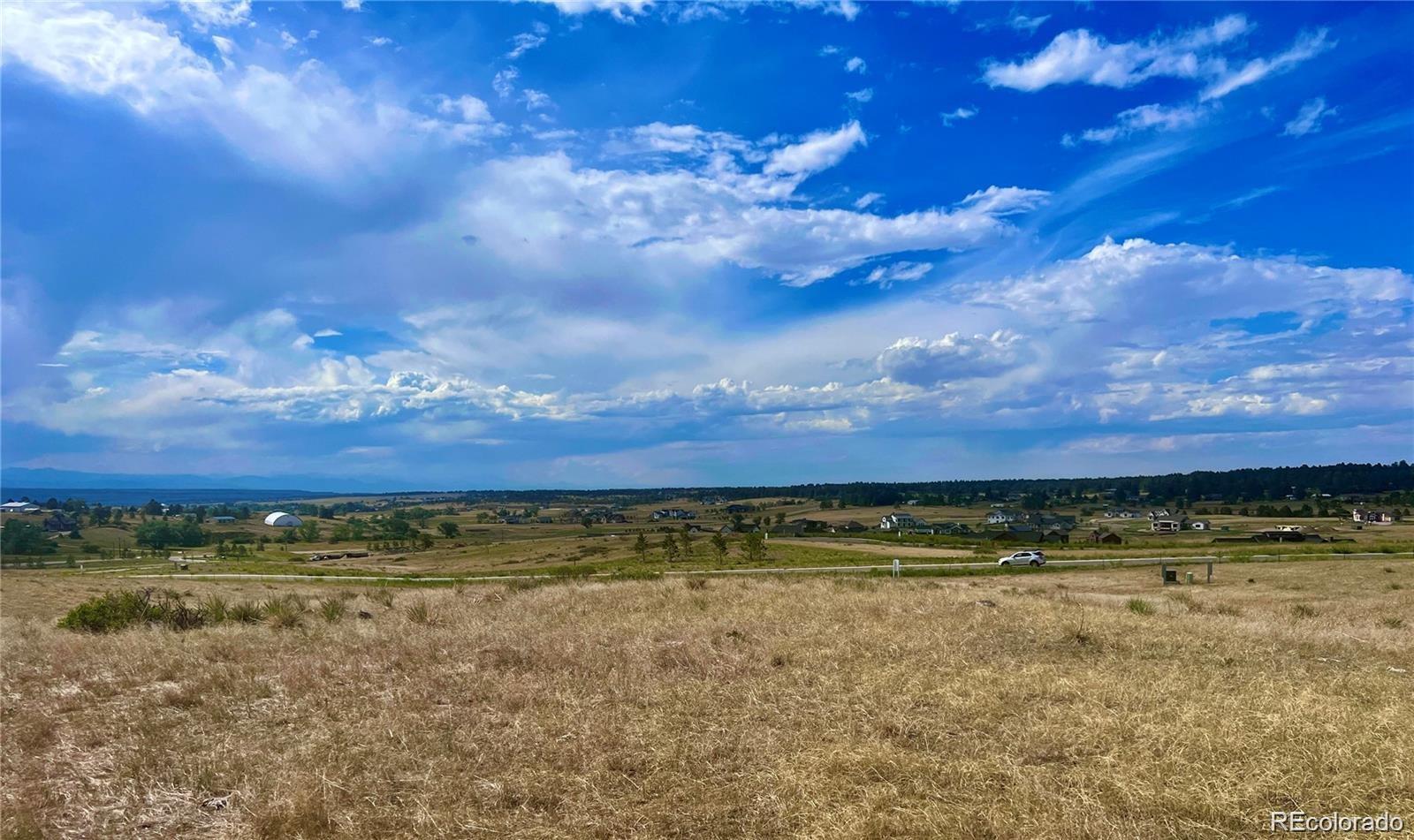75 Evening Hunt Road Franktown, CO 80116 - Photo 3 of 7 a view of an outdoor space and yard