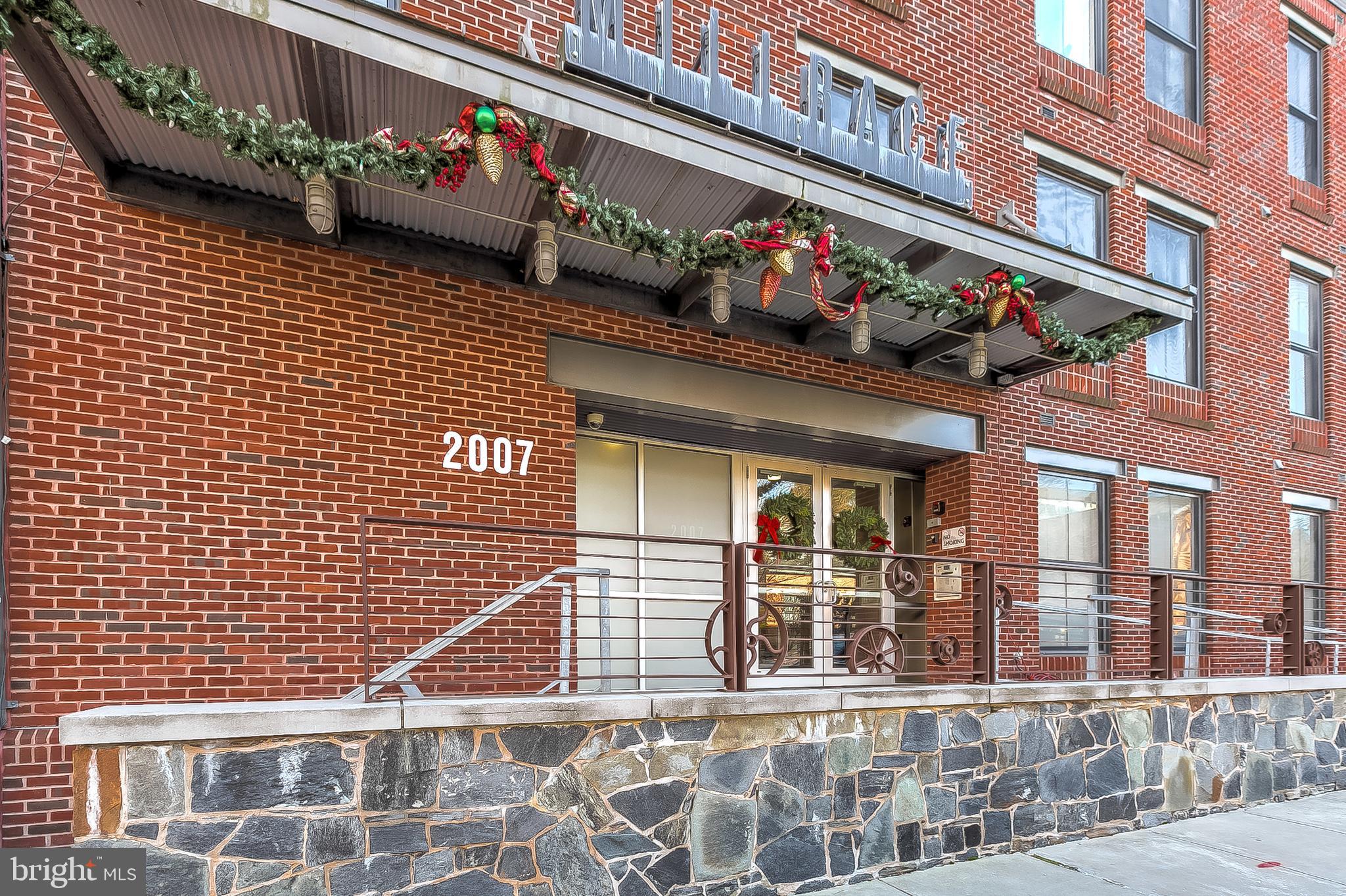 2007 Clipper Park Road, Unit 425 Baltimore, MD 21211 - Photo 33 of 51 Front of Mill Race Building