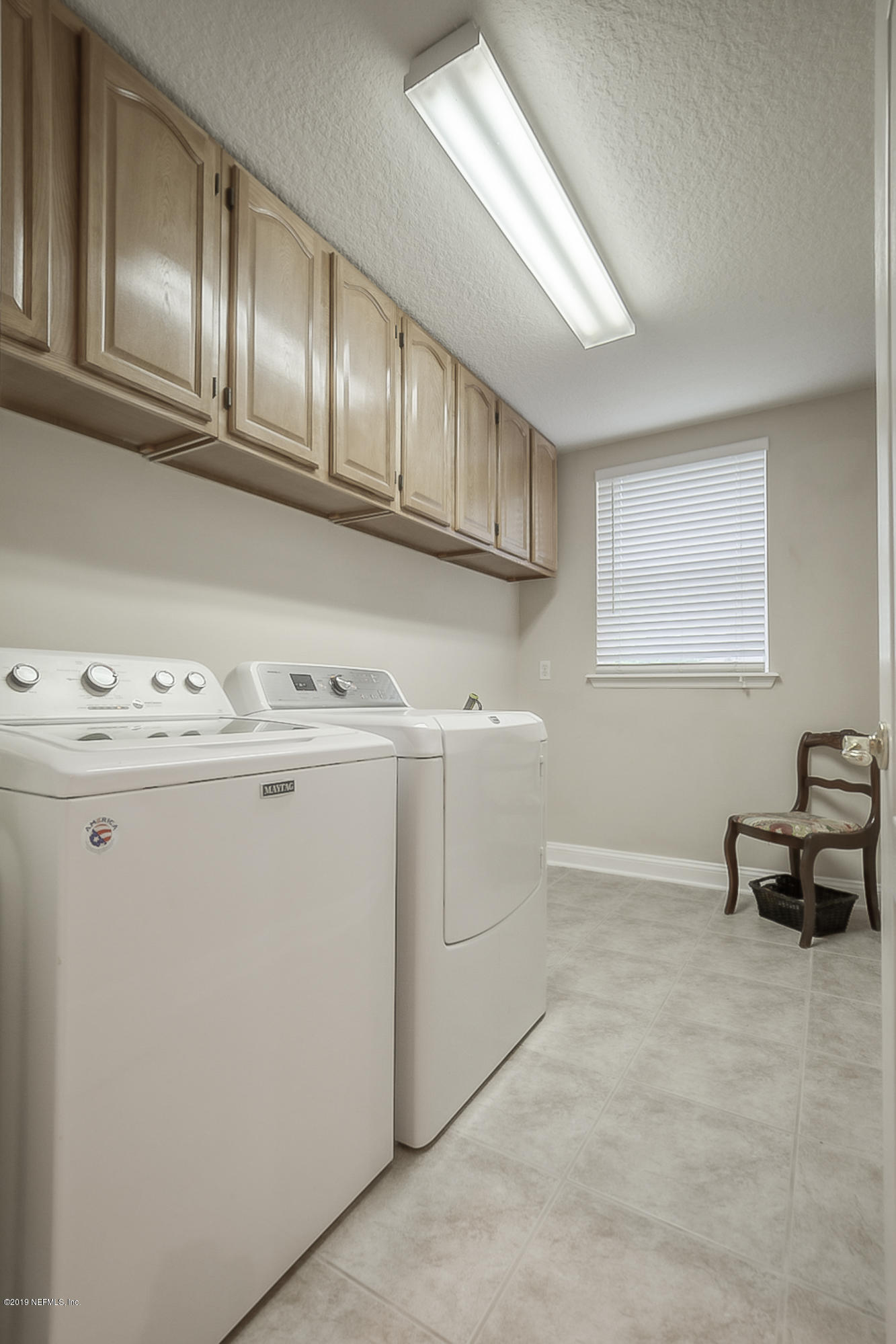 1327 Powis Road St. Augustine, FL 32095 - Photo 50 of 56 a utility room with dryer and washer