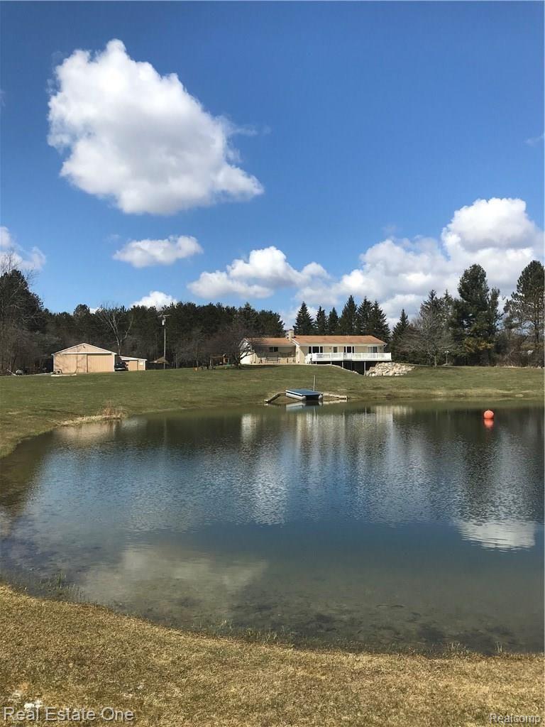 4096 South Lake George Road Dryden, MI 48428 - Photo 1 of 18 LG fr south side of Pond toward house.jpeg
