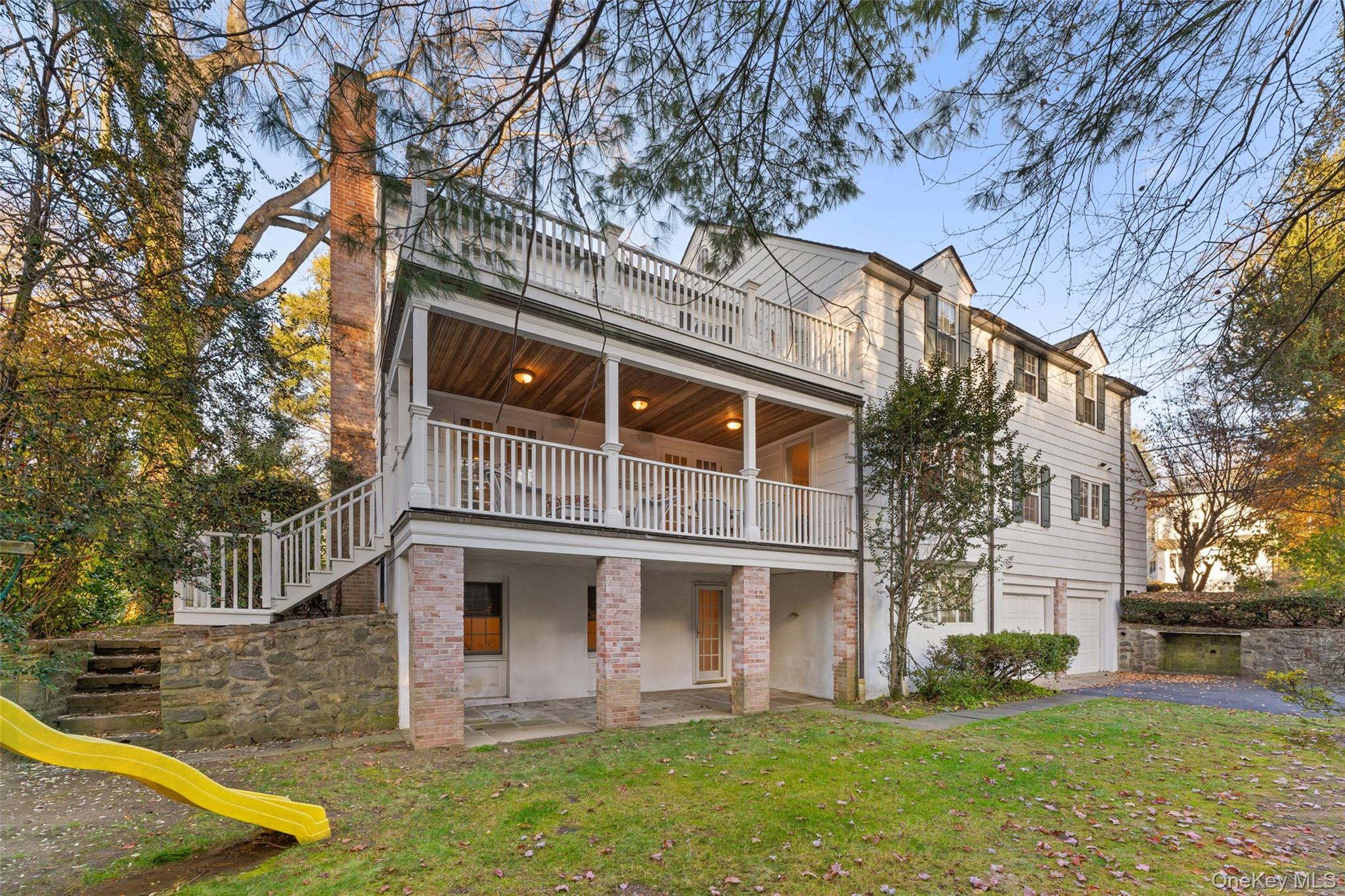 24 Olmsted Road Scarsdale, NY 10583 - Photo 34 of 39 front view of house with a yard