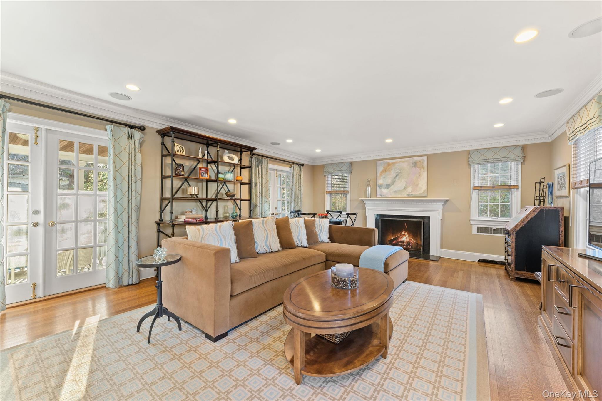 24 Olmsted Road Scarsdale, NY 10583 - Photo 4 of 39 a living room with furniture and a fireplace