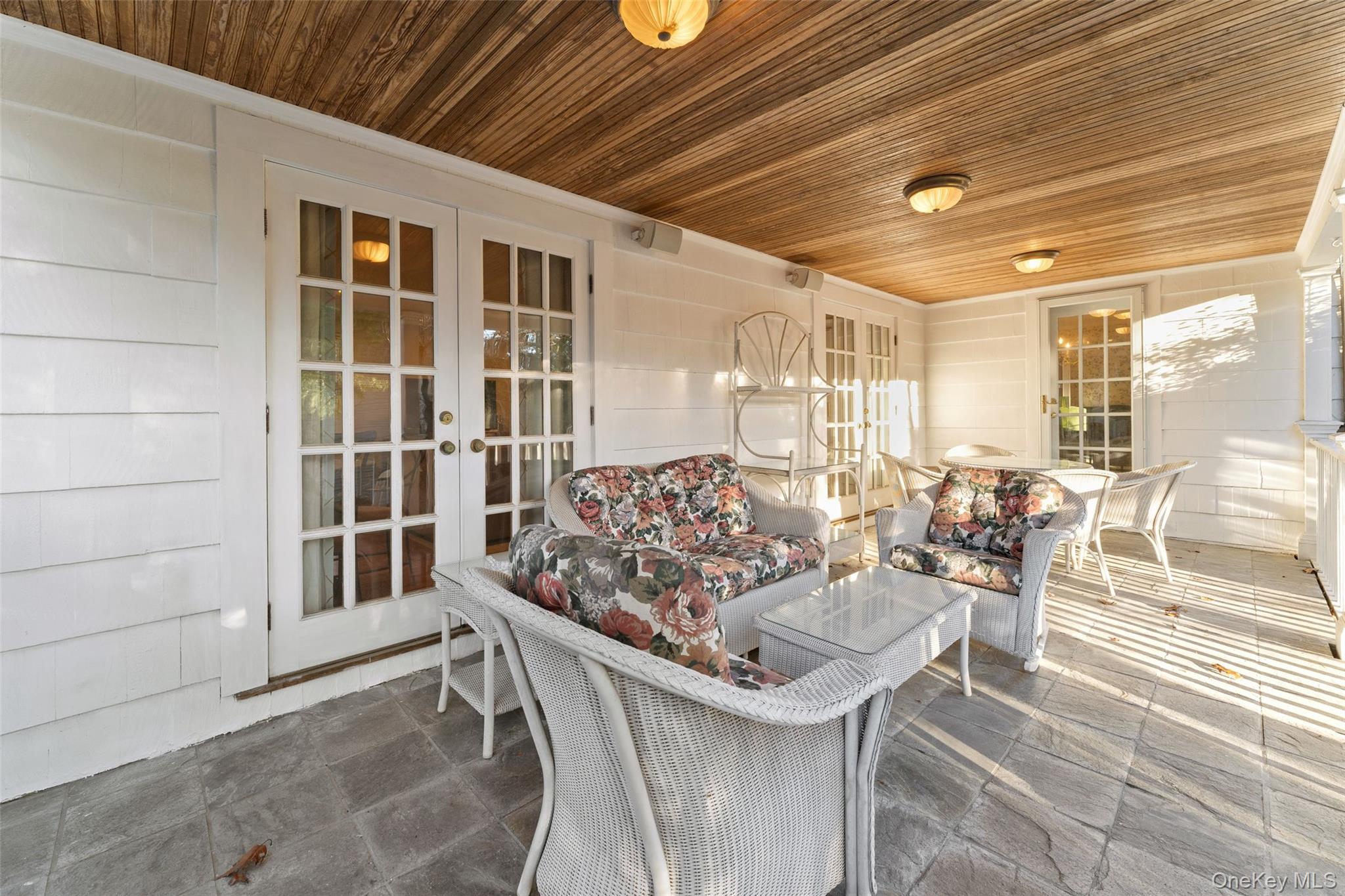 24 Olmsted Road Scarsdale, NY 10583 - Photo 6 of 39 a view of a dining room with furniture and wooden floor