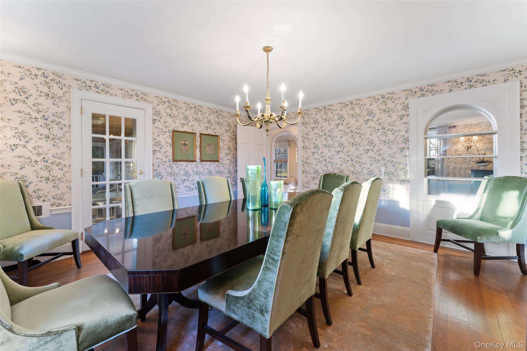 24 Olmsted Road Scarsdale, NY 10583 - Photo 8 of 39 a view of a dining room with furniture and wooden floor