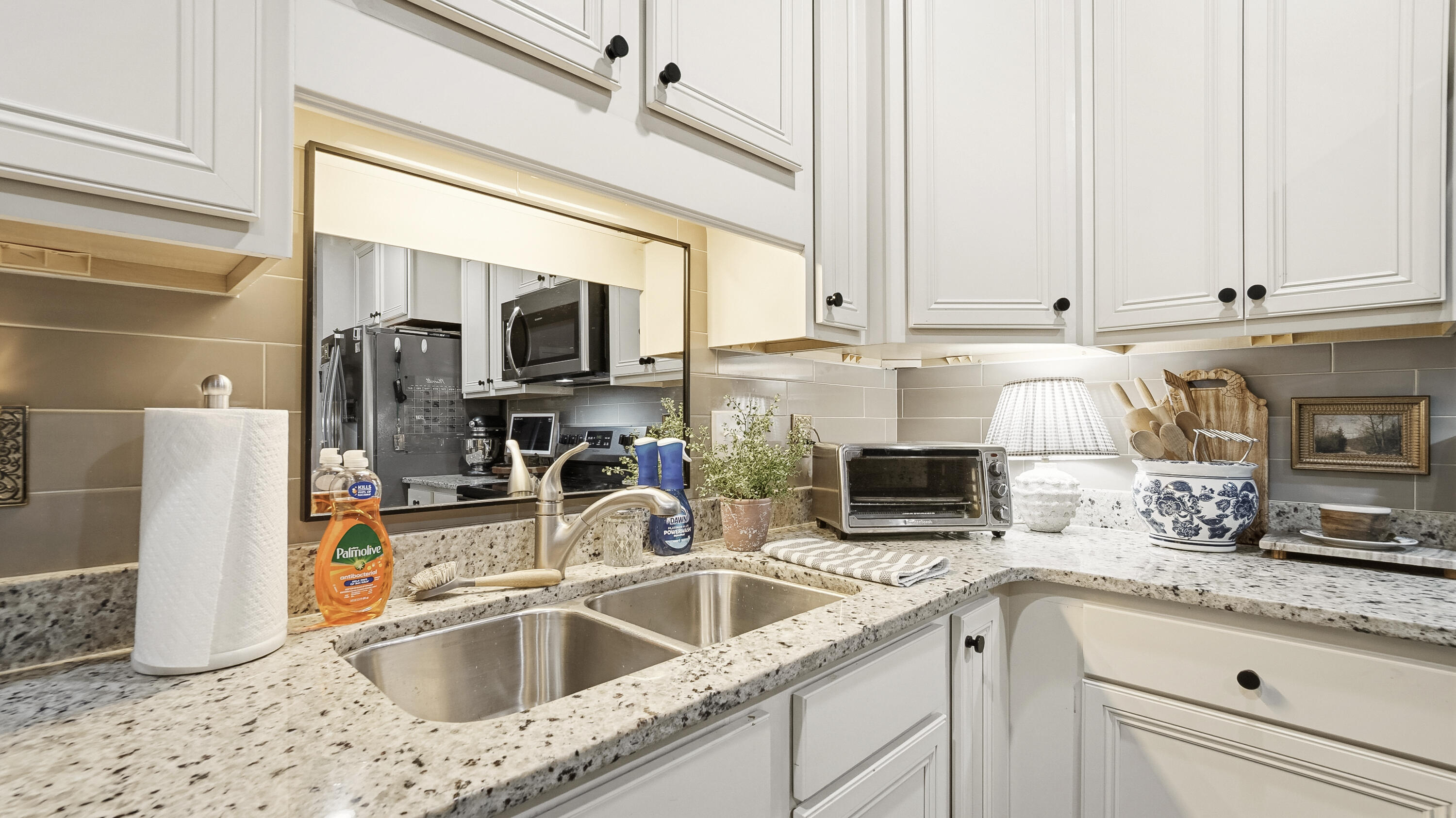 54 Lottie Loop Freeport, FL 32439 - Photo 16 of 63 a kitchen with stainless steel appliances granite countertop a sink and a microwave