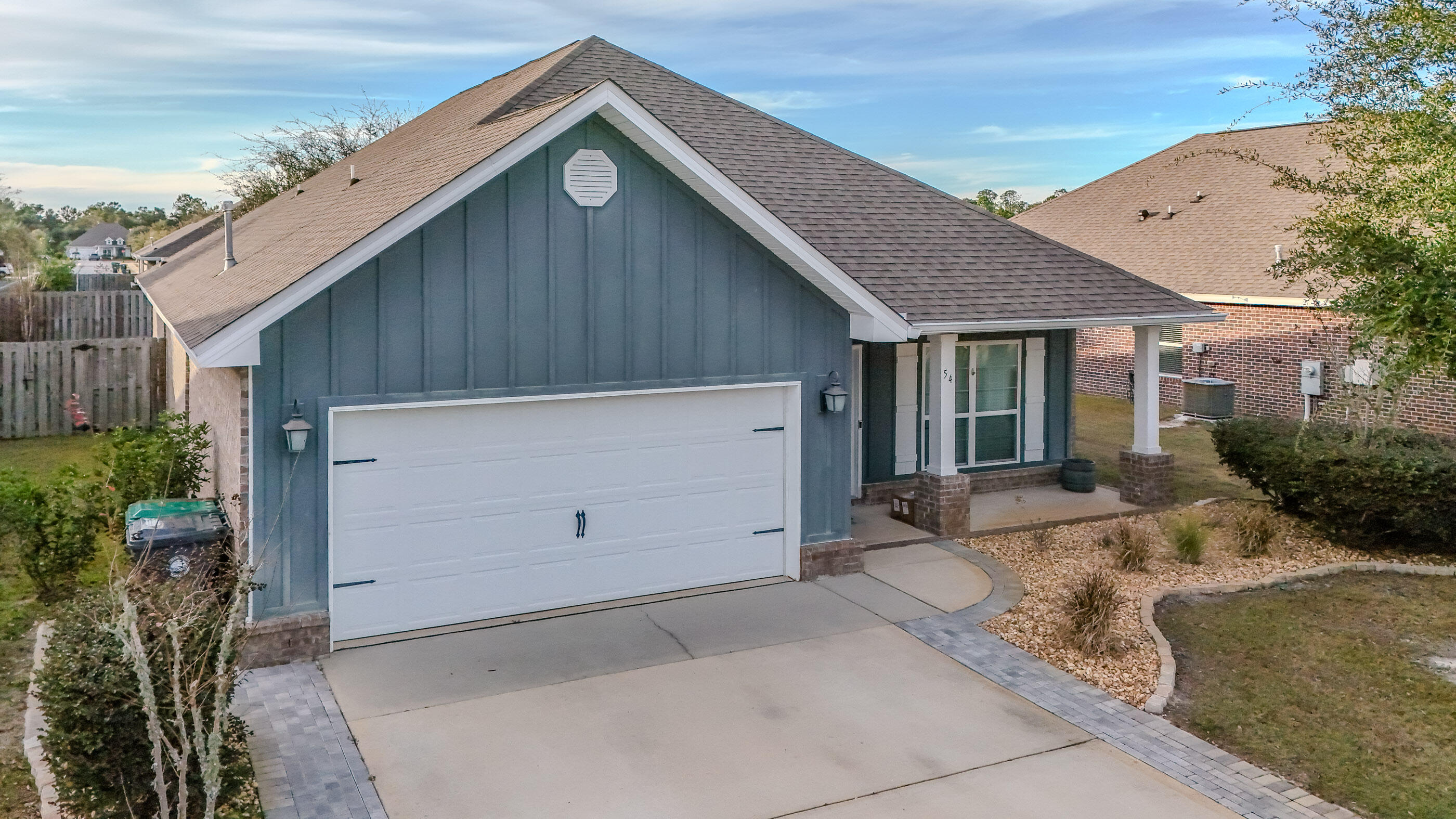 54 Lottie Loop Freeport, FL 32439 - Photo 2 of 63 a view of a house with backyard and garden