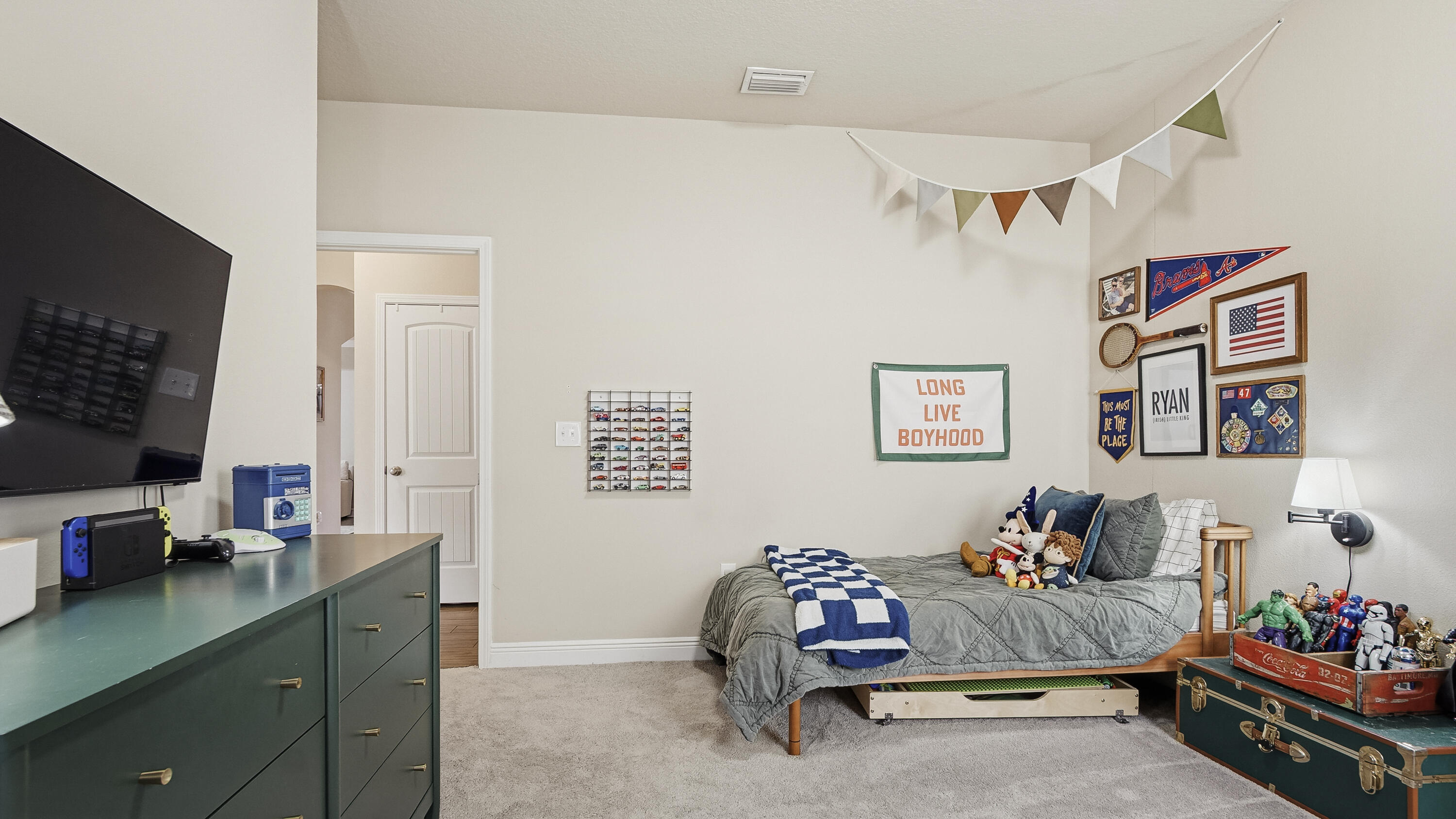 54 Lottie Loop Freeport, FL 32439 - Photo 24 of 63 a bedroom with furniture and a flat screen tv