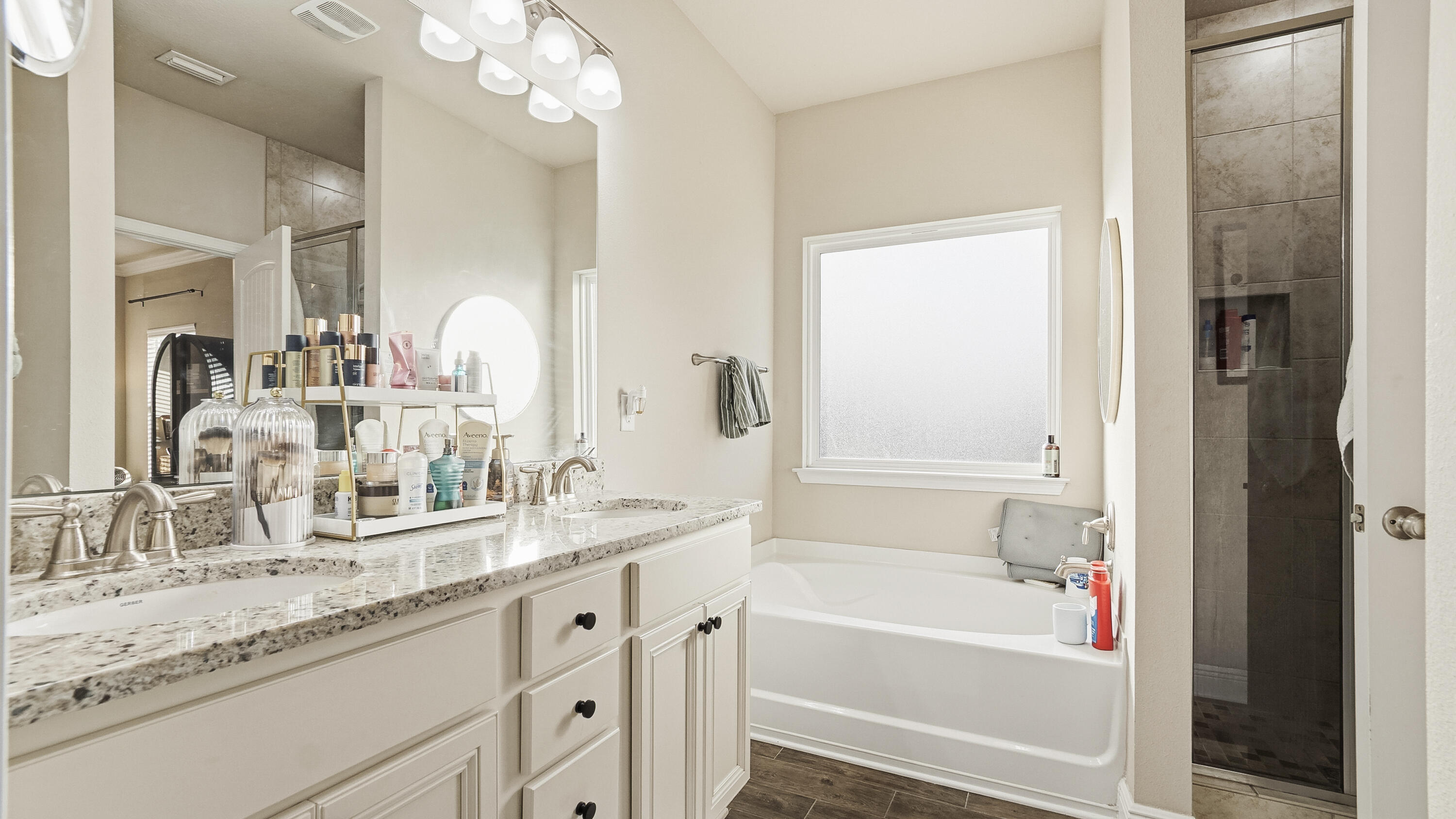 54 Lottie Loop Freeport, FL 32439 - Photo 34 of 63 a bathroom with a granite countertop sink mirror and vanity