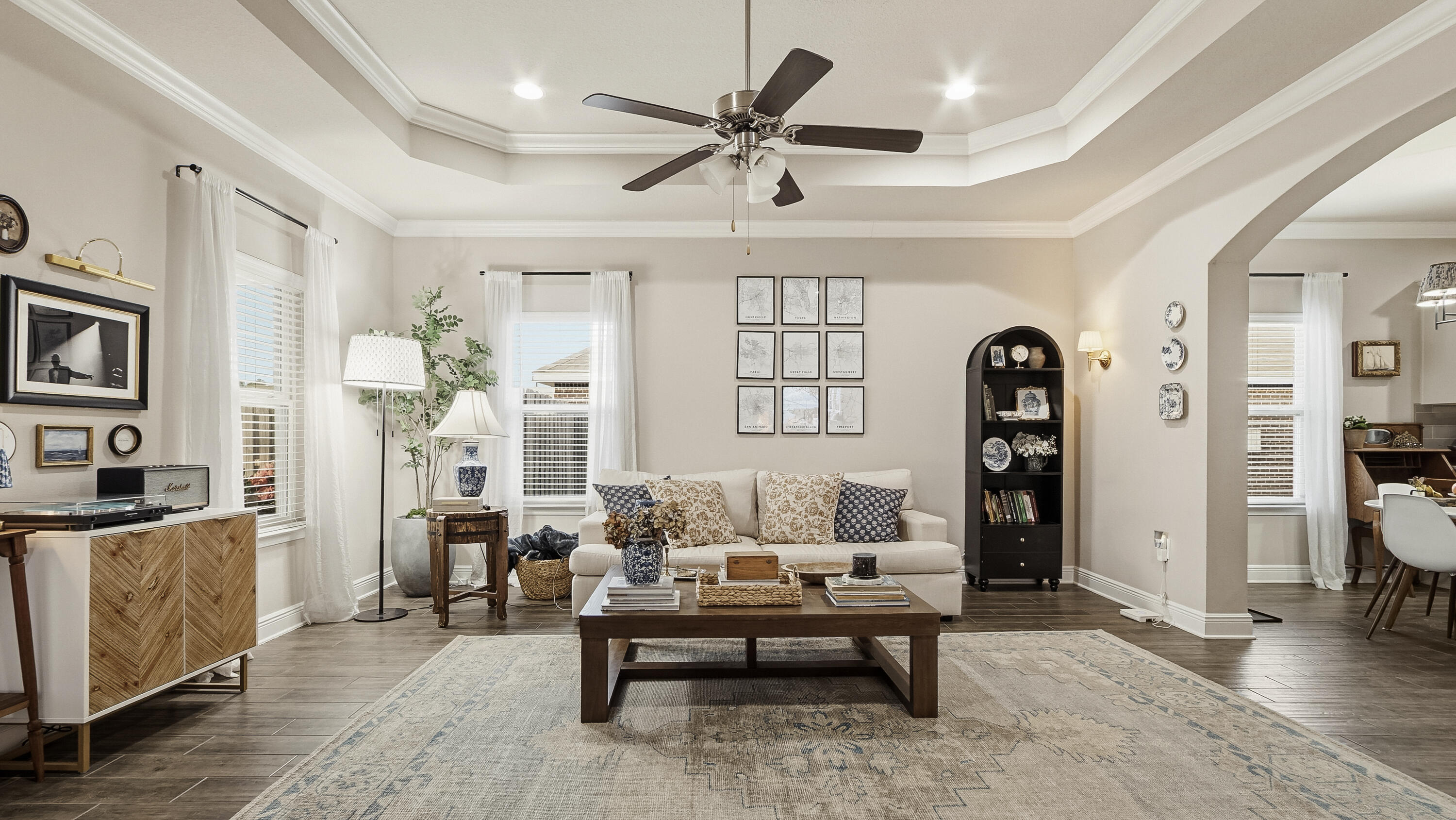 54 Lottie Loop Freeport, FL 32439 - Photo 35 of 63 a living room with furniture a rug and a chandelier