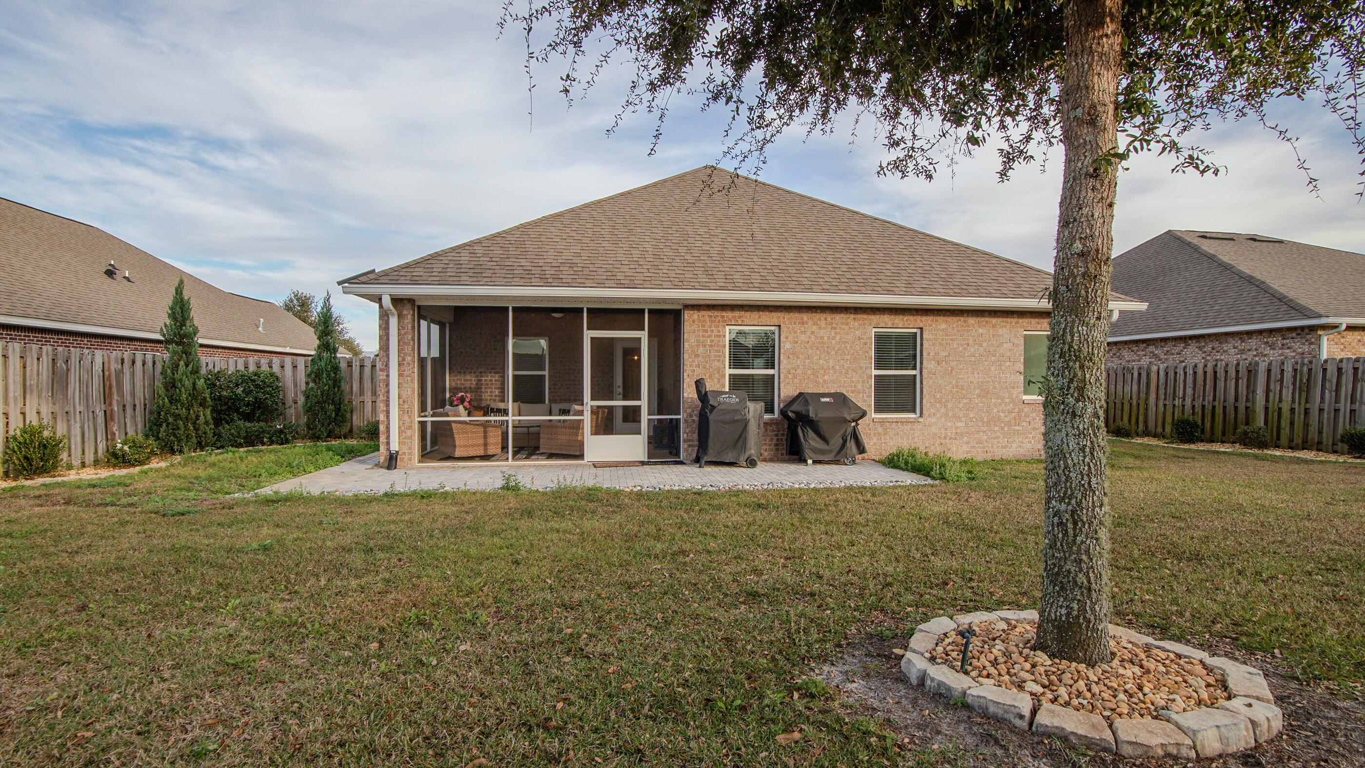 54 Lottie Loop Freeport, FL 32439 - Photo 40 of 63 a front view of a house with a yard