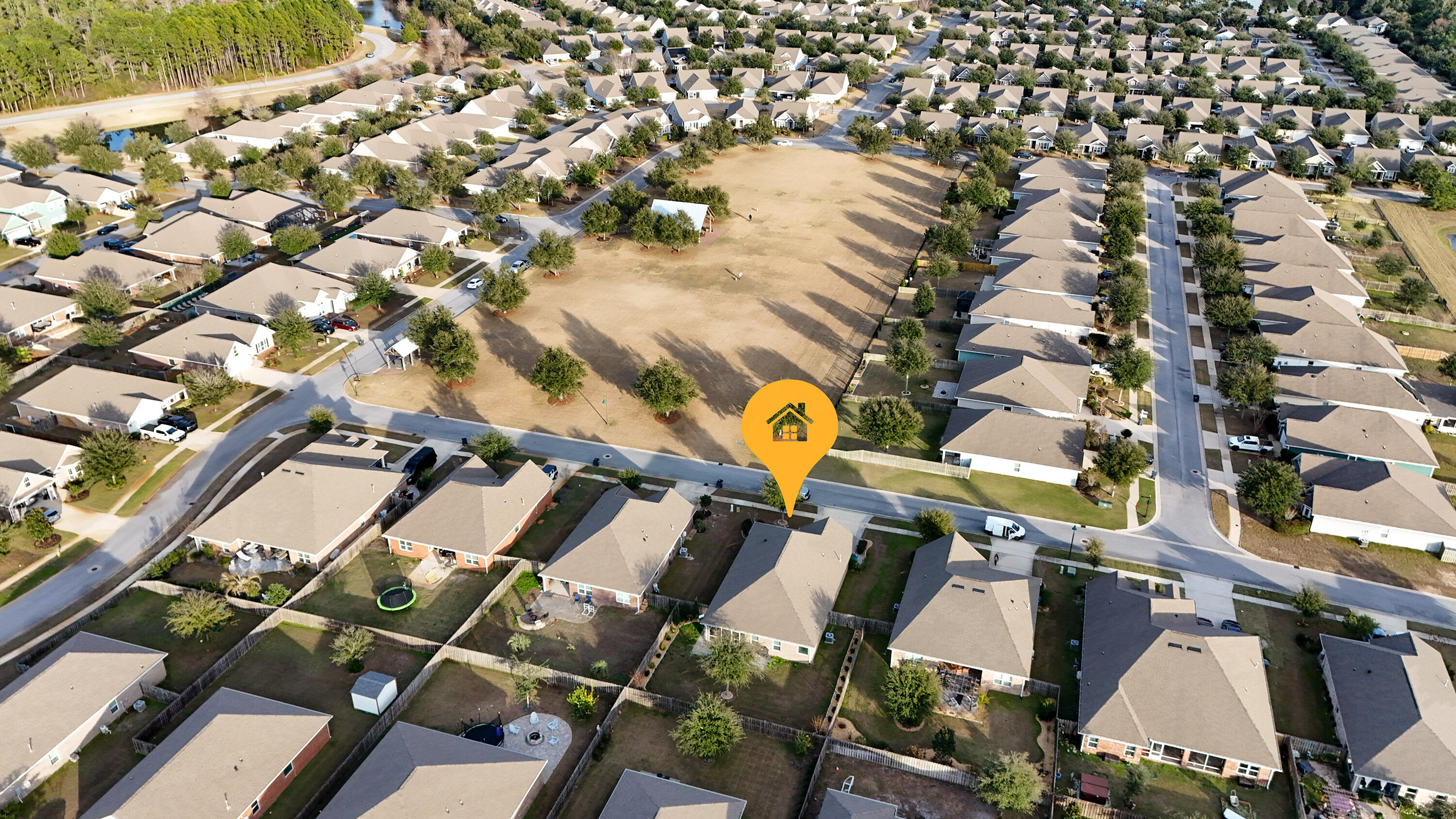 54 Lottie Loop Freeport, FL 32439 - Photo 4 of 63 an aerial view of a building with outdoor space