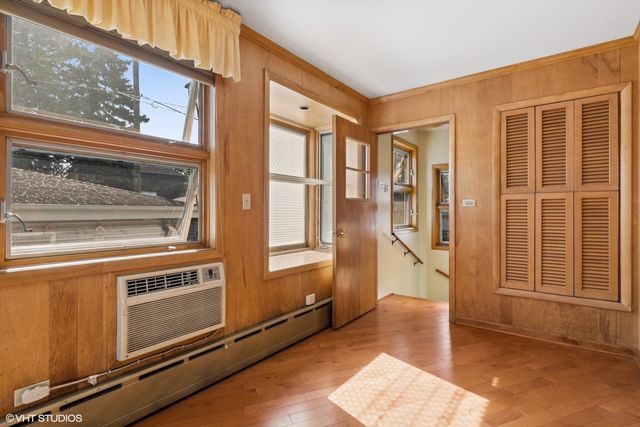 a view of an entryway with a kitchen